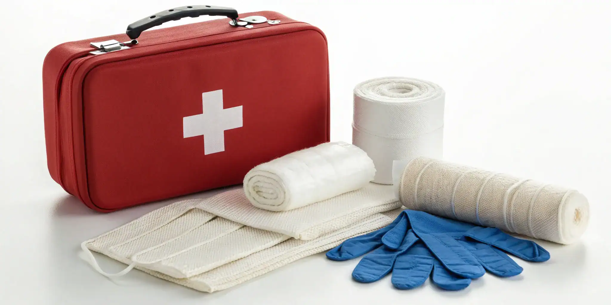 First aid kit and supplies for an employee first aid certification course.