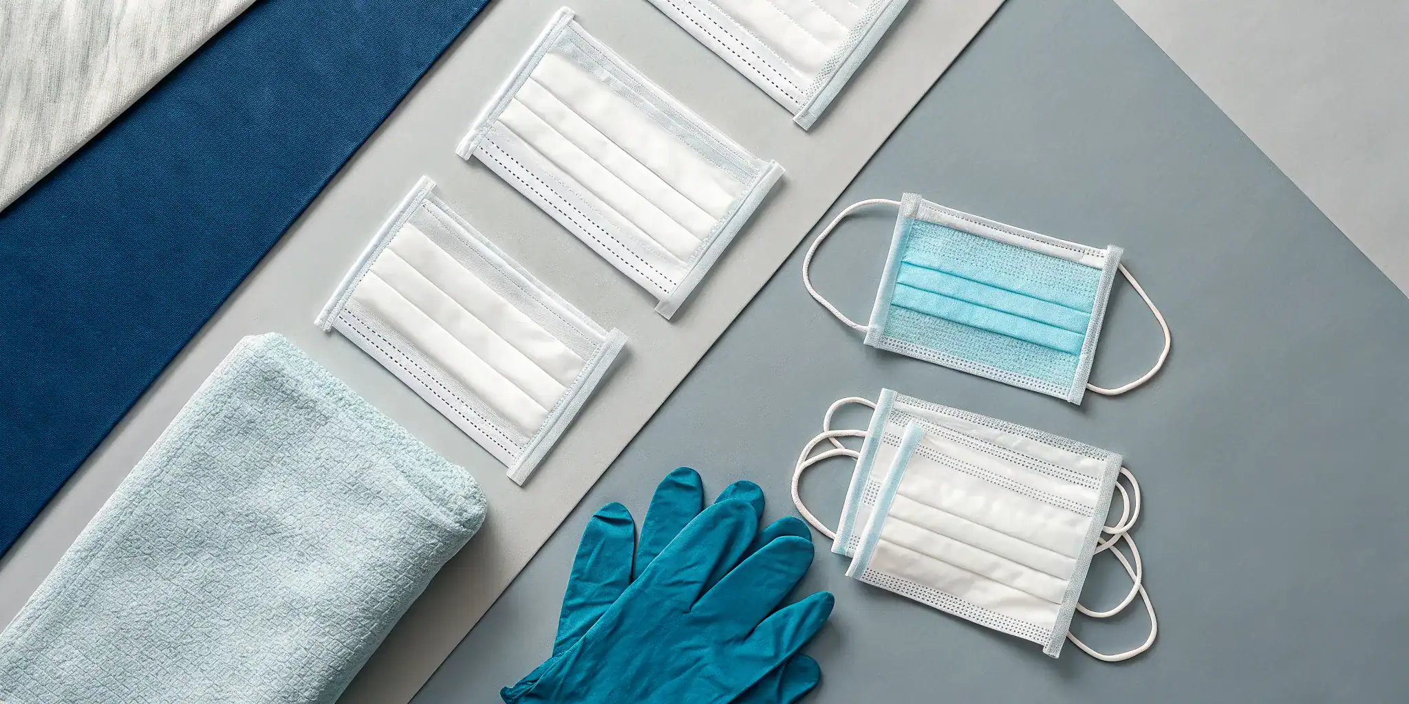 Essential supplies like gloves and cloths for basic bleeding control techniques.